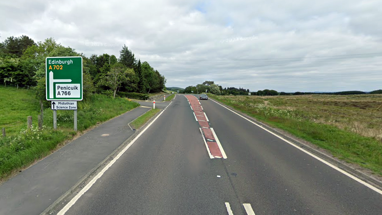 RESURFACING THE A702 NEAR THE A766 JUNCTION